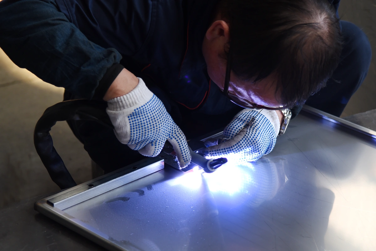 KDM enclosure manufacturing workplace scene 4